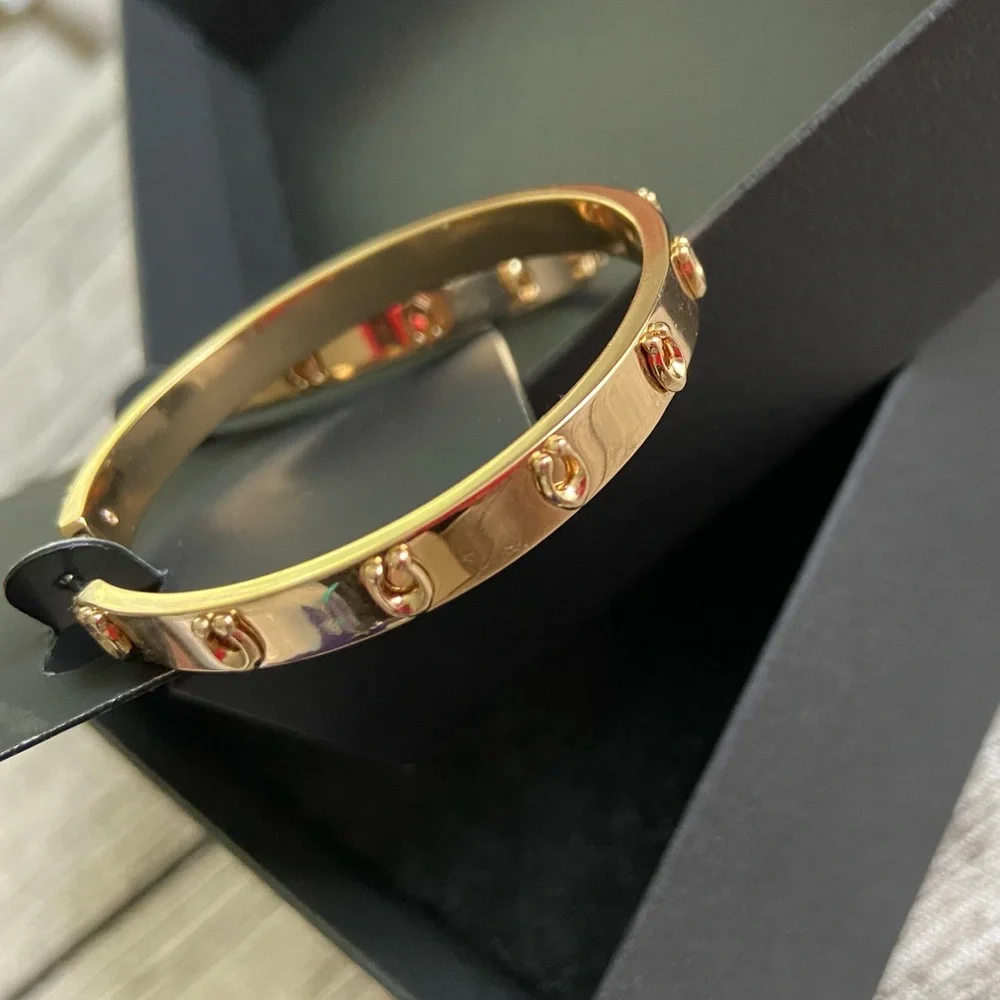 NWT! Coach hoop earrings with C logos in beautiful gold tone. Raised “C” logos - Picture 5 of 8